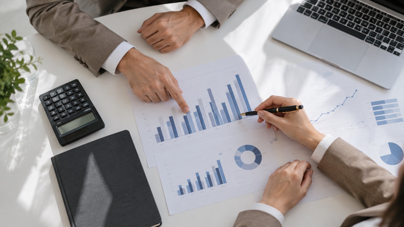 Review of charts and documents on the negotiating table